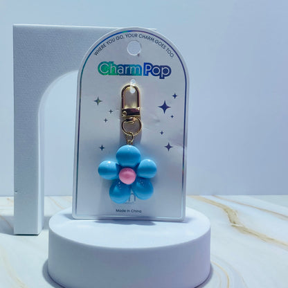 LLAVERO FLOR PLASTICA