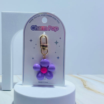 LLAVERO FLOR PLASTICA