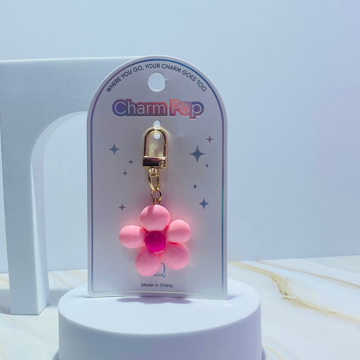 LLAVERO FLOR PLASTICA