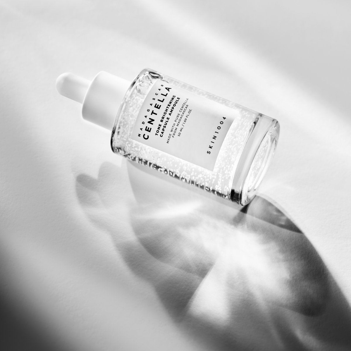 [Skin1004] Ampolla Serum de cápsula iluminadora de tono Madagascar Centella 50 ml